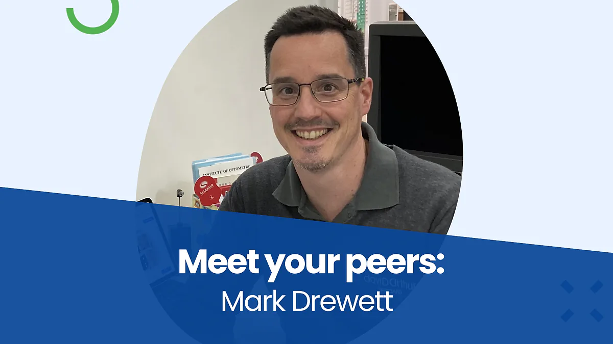 Mark Drewett smiling in his practice, with the words 'Meet your peers'